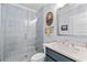 Modern bathroom with sleek fixtures, tiled shower, and elegant vanity, creating a spa-like experience at 4064 Comanche Dr, Tucker, GA 30084
