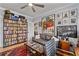 Functional home office with built-in shelving, ample storage, and comfortable seating, ideal for productivity at 4064 Comanche Dr, Tucker, GA 30084