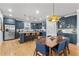 Spacious kitchen with a large island, barstool seating, and stainless steel appliances at 4064 Comanche Dr, Tucker, GA 30084