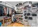 Well-organized walk-in closet with ample storage for clothes, shoes, and accessories at 4064 Comanche Dr, Tucker, GA 30084