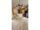 Open kitchen with granite countertops, tiled floors, modern lighting, and stainless steel appliances that add a sleek touch at 5760 Old Carriage Dr, Atlanta, GA 30349
