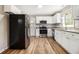 Modern kitchen with stainless steel appliances, granite countertops and white cabinets at , Decatur, GA 30035