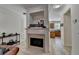 Elegant fireplace with mantle and view to kitchen at 1213 Harris Commons Place, Roswell, GA 30076
