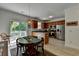 Bright kitchen with stainless steel appliances and a dining area at 1213 Harris Commons Place, Roswell, GA 30076