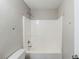 Bathroom interior featuring a white shower and tub combination with gray walls at 167 Fairview Oak Trl, Dallas, GA 30157