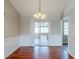 Bright dining area with laminate flooring and sliding glass door to the backyard at 167 Fairview Oak Trl, Dallas, GA 30157