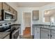 Kitchen showcasing stainless appliances and convenient layout at 167 Fairview Oak Trl, Dallas, GA 30157