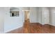 Living room view showcasing laminate floors, fresh paint, and open layout at 167 Fairview Oak Trl, Dallas, GA 30157