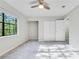 Bedroom featuring bright natural light and closets at 2622 Terrace Pkwy, Morrow, GA 30260