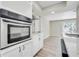 Modern kitchen with stainless steel oven and views to the living room at 2622 Terrace Pkwy, Morrow, GA 30260