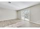 Living area with sliding glass door leading to the back yard at 2622 Terrace Pkwy, Morrow, GA 30260