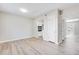 Spacious living room with views into the kitchen and access to backyard at 2622 Terrace Pkwy, Morrow, GA 30260