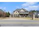 Well-maintained home with beautiful landscaping, gated entrance, and a private, serene setting at 3308 Pate Rd, Snellville, GA 30078