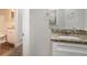 Bathroom featuring a granite countertop and a neutral-toned vanity at 5052 W Mountain St, Stone Mountain, GA 30083