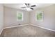 Bedroom featuring neutral walls and carpet at 5052 W Mountain St, Stone Mountain, GA 30083