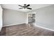 Spacious living room with wood floors and natural light at 5052 W Mountain St, Stone Mountain, GA 30083