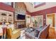 Inviting living room boasts a stone fireplace, hardwood floors, comfortable seating, and a large window at 963 Manor Parc Dr, Decatur, GA 30033