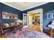 Bright living room with French doors, offering a view of other rooms, complemented by stylish decor and comfortable seating at 963 Manor Parc Dr, Decatur, GA 30033