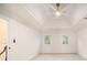 Spacious bedroom features a modern ceiling fan and two windows allowing natural light at 1122 Manning Farms Ct, Atlanta, GA 30338