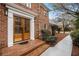 Charming brick home with a double door front entrance and landscaped yard at 1122 Manning Farms Ct, Atlanta, GA 30338