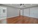 This bright bedroom has hardwood floors, closet space, and an ensuite bath at 1857 Derrill Dr, Decatur, GA 30032