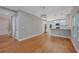 Open-concept area with kitchen and staircase with hardwood floors at 1857 Derrill Dr, Decatur, GA 30032