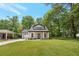 Charming craftsman-style home with well-manicured lawn and inviting front porch at 1857 Derrill Dr, Decatur, GA 30032