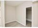 Neutral bedroom features an empty closet and light-colored floors, creating a simple, bright space at 4579 Glenforest Ne Dr, Roswell, GA 30075