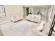 Bright living room with light gray walls, hardwood floors, and modern furniture at 4579 Glenforest Ne Dr, Roswell, GA 30075