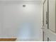 Bright foyer featuring stylish floor tiles, fresh white walls, and a partial view of the wooden door at 115 Woodmere Nw Sq # 115, Atlanta, GA 30327
