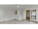 Cozy sunroom with fan, tile floor, and access to the outdoors at 115 Woodmere Nw Sq # 115, Atlanta, GA 30327