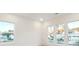 Well-lit room with multiple windows offering neighborhood views and natural light at 1925 Harken Grv, Marietta, GA 30064