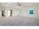 Large primary bedroom with ensuite bathroom and plush carpeting at 1925 Harken Grv, Marietta, GA 30064