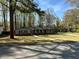 Well-maintained brick home with green lawn and mature trees in a desirable location at 4063 Windsor Castle Way, Decatur, GA 30034