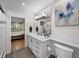 Updated bathroom with a large mirror and white vanity at 5210 Chemin De Vie, Atlanta, GA 30342