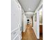 Inviting entryway with hardwood floors, leading to living areas and staircase at 5210 Chemin De Vie, Atlanta, GA 30342