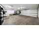 Large garage with high ceilings, ready for organization and project space at 5210 Chemin De Vie, Atlanta, GA 30342