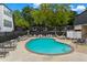 Outdoor swimming pool and lounge area provides a relaxing community space at 5210 Chemin De Vie, Atlanta, GA 30342