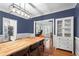 Open-concept dining room with modern lighting, hardwood floors, and views into the kitchen and office at 5729 Brookstone Nw Walk, Acworth, GA 30101
