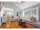 Spacious living room with hardwood floors, vaulted ceilings, and ample natural light at 5729 Brookstone Nw Walk, Acworth, GA 30101