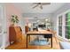 Home office featuring hardwood floors, ample workspace, natural light, and modern decor at 5729 Brookstone Nw Walk, Acworth, GA 30101