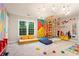 Bright playroom with vibrant climbing structure, colorful walls, and creative play area at 5729 Brookstone Nw Walk, Acworth, GA 30101