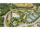Aerial view of community amenities including a pool, tennis courts, playground, and clubhouse at 114 Montgomery Ln, Villa Rica, GA 30180