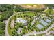 Aerial view of community amenities including a pool, tennis courts, playground, and clubhouse at 114 Montgomery Ln, Villa Rica, GA 30180