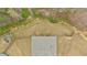 An aerial view of the backyard features a well-maintained lawn and landscaping, offering privacy and space for outdoor activities at 114 Montgomery Ln, Villa Rica, GA 30180