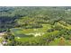 Scenic aerial view of the golf course with lush greenery and sparkling water features at 114 Montgomery Ln, Villa Rica, GA 30180