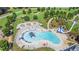 Aerial view of a vibrant community pool with water slides, splash pad and many amenities at 114 Montgomery Ln, Villa Rica, GA 30180