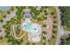 Aerial view of the community center with a large pool, splash pad, playground and landscaping at 114 Montgomery Ln, Villa Rica, GA 30180