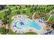 Aerial view of a vibrant community pool with water slides, splash pad and many amenities at 114 Montgomery Ln, Villa Rica, GA 30180