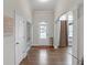Welcoming foyer with natural light, hardwood floors, and classic architectural details at 114 Montgomery Ln, Villa Rica, GA 30180